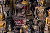 Luang Prabang, Laos - The Pak Ou Caves, the lower cave called Tham Ting. The caves, a Buddhist pilgrimage site, are a repository of old Buddha statues. 